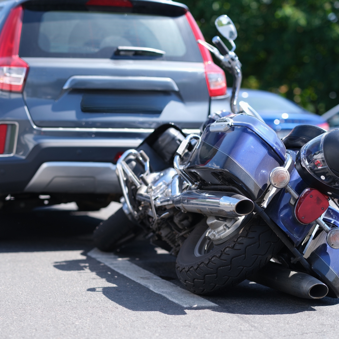 Motorcycle crashed into rear end of car