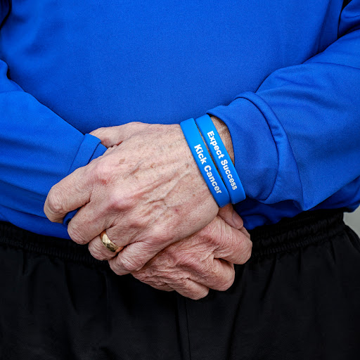 Cancer Survivor Closeup Hands and Wristbands